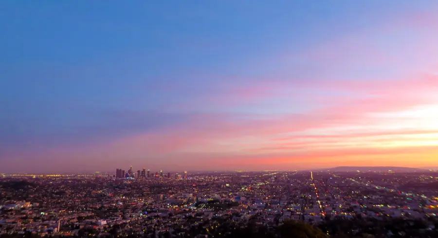 Los Angeles at twilight under a pink and purple sky